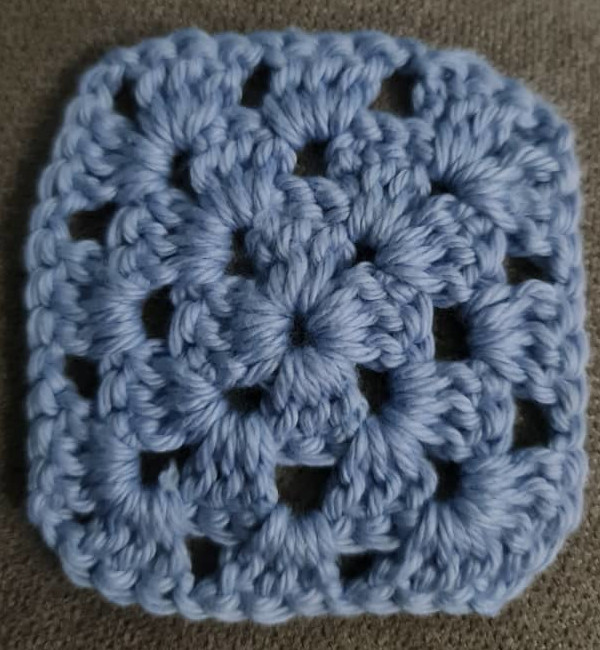 A crochet coaster for coffee mugs