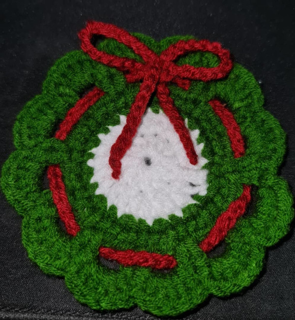 A christmas wreath made of crochet